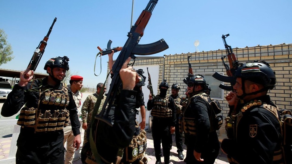 Dân quân Iraq dọa đưa lính Mỹ về nước bằng quan tài - 1 Dân quân Iraq dọa đưa lính Mỹ về nước bằng quan tài - 1