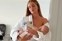 Dự Liên hoan phim Cannes, bạn gái "Người vận chuyển" khoe ảnh cho con bú