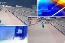 Nhân viên đường sắt chạy đua với tàu, cứu em bé thoát khỏi "tử thần"