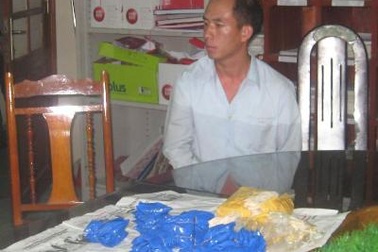 Tuồn 60 bánh heroin cùng 12.000 viên ma túy tổng hợp từ Lào vào Việt Nam