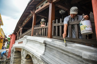 Thành phố Hội An "chiều" dư luận, sơn lại Chùa Cầu… cho cũ?