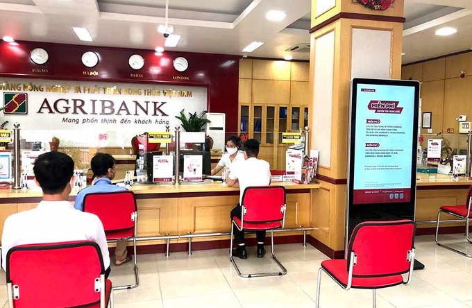 Agribank đã giải ngân hơn 116 ngàn tỷ đồng và 122 triệu USD cho vay ưu đãi hỗ trợ người dân, doanh nghiệp - Ảnh 1.