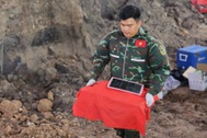 Tìm thấy thêm 13 bộ hài cốt liệt sĩ ở rãnh mộ mới tại Công viên Lê Thị Riêng