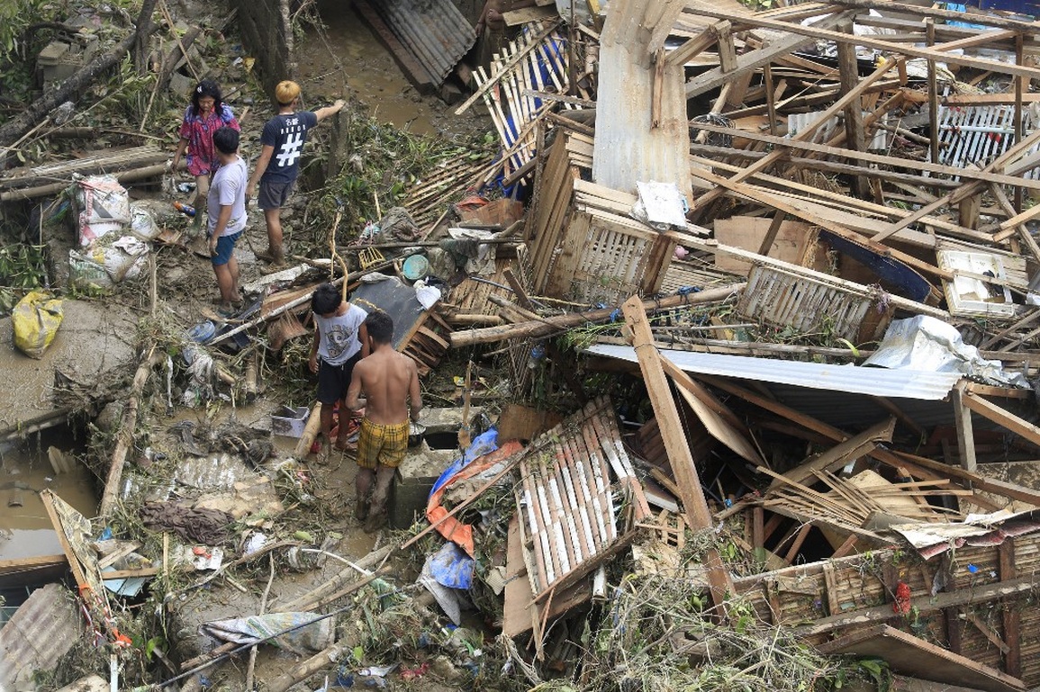 Siêu bão Rai san phẳng nhiều nơi ở Philippines, 24 người chết - 9 Siêu bão Rai san phẳng nhiều nơi ở Philippines, 24 người chết - 9