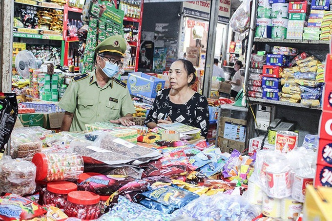 Người dân hãy gọi ngay cho quản lý thị trường nếu phát hiện tình trạng đầu cơ tăng giá, thu lợi bất chính - Ảnh 1.