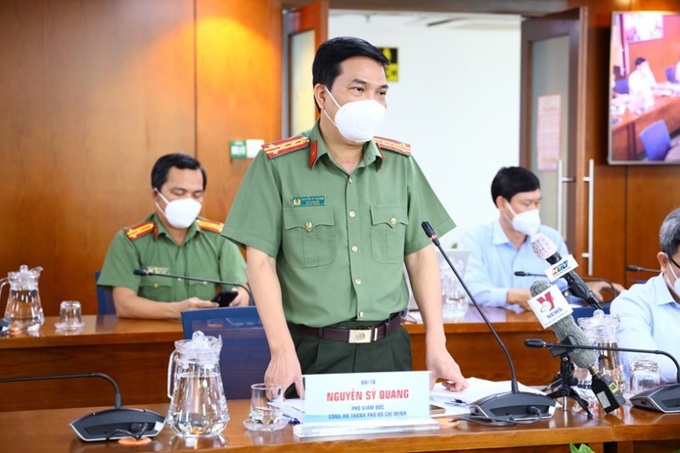 Phó giám đốc Công an TP.HCM Nguyễn Sĩ Quang thông tin tại cuộc họp báo.