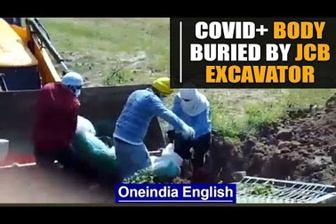 Con trai bệnh nhân Covid-19 dùng máy xúc chôn thi thể cha ở Ấn Độ