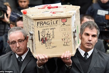 Tranh biếm họa phủ kín quan tài nạn nhân vụ khủng bố Charlie Hebdo