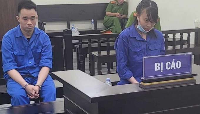 Đoàn Diệu Linh và Hoàng Thế Vũ  tại phiên toà sơ thẩm.