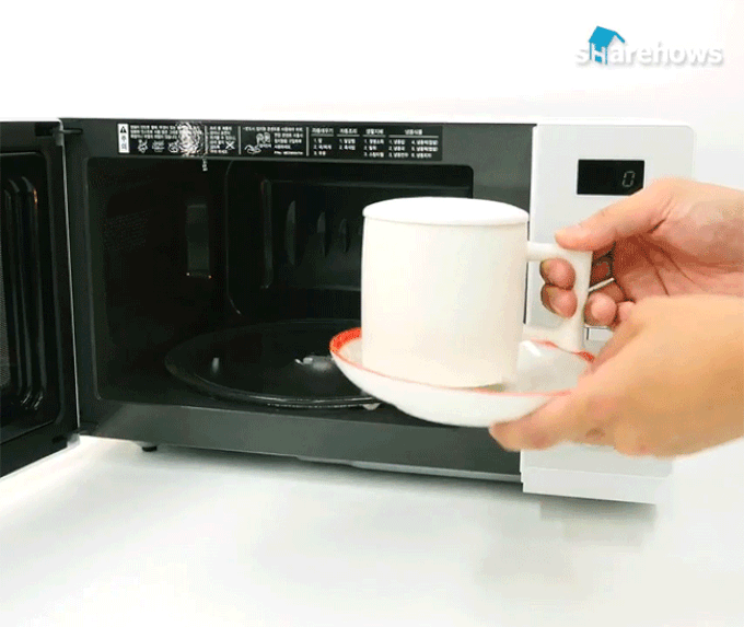 Chần trứng, nấu cơm chỉ với chiếc cốc sứ - tưởng đùa hóa ra thật 100% - Ảnh 4. Chần trứng, nấu cơm chỉ với chiếc cốc sứ - tưởng đùa hóa ra thật 100% - Ảnh 4.