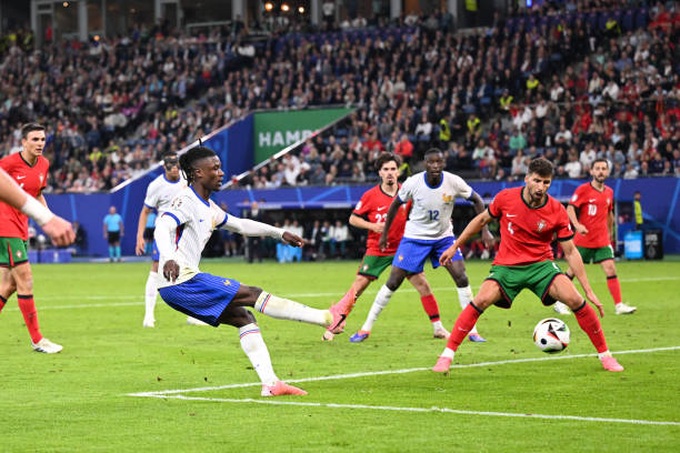 eduardo-camavinga-of-france-and-ruben-dias-of-portugal-during-the-uefa-euro-2024-quarter.jpg