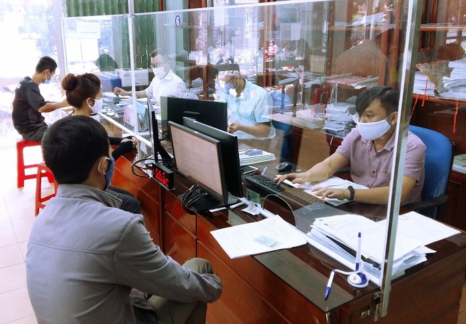 Vừa chống dịch vừa giải quyết chế độ cho người lao động - Ảnh 1. Vừa chống dịch vừa giải quyết chế độ cho người lao động - Ảnh 1.