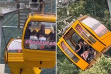 Cáp treo bị gió thổi làm bung cửa, du khách rơi từ độ cao 10m xuống vực