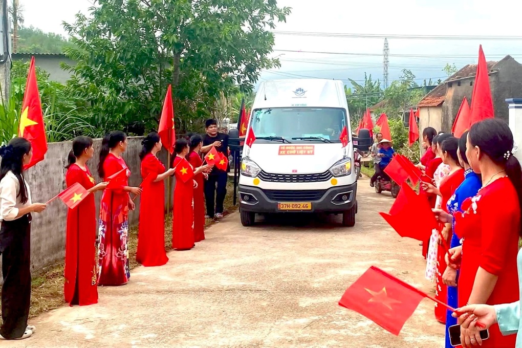 Quê nhà xúc động đón liệt sĩ trở về sau 52 năm - 1
