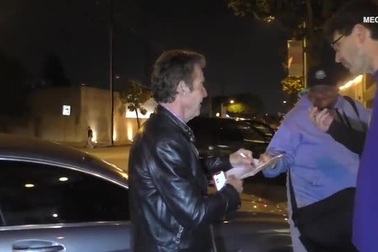 Dennis Quaid bên bạn gái cũ Santa Auzina hồi tháng 5