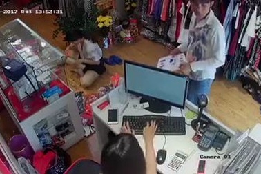 Trộm iPhone chớp nhoáng tại shop bán quần áo