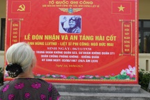 An táng hài cốt phi công anh hùng Ngô Đức Mai