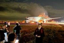 Nỗ lực thoát hiểm "nghẹt thở" của hành khách trên máy bay Nhật Bản bốc cháy