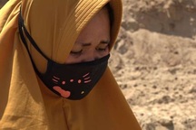 Bi kịch của một góa phụ cạnh hố chôn tập thể nạn nhân động đất/sóng thần Indonesia