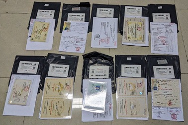 Lật tẩy mật mã "tranh phong thủy" của đường dây vận chuyển tài liệu giả