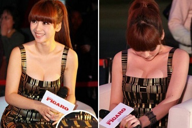 Người mẫu siêu vòng một của Trung Quốc bối rối vì váy hai dây