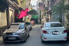 Bị phạt 2,5 triệu đồng vì đỗ ô tô trước cửa nhà mình