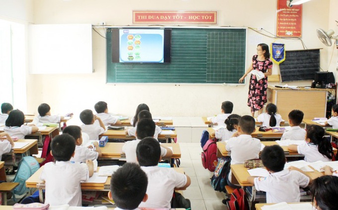 Bộ GD&ĐT yêu cầu thực hiện nghiêm việc trang bị SGK và tài liệu tham khảo trong trường Tiểu học - Ảnh 1. Bộ GD&ĐT yêu cầu thực hiện nghiêm việc trang bị SGK và tài liệu tham khảo trong trường Tiểu học - Ảnh 1.