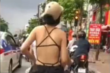 Phản ứng của Gen Z trước việc cô gái mặc áo hở lưng bị quay video bình phẩm