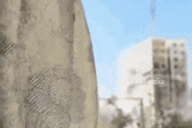 Khoảnh khắc hỏa lực Israel đánh sập tòa nhà 15 tầng ở Gaza