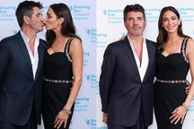 Ông bầu giàu có Simon Cowell tình tứ hôn bạn gái kém 18 tuổi