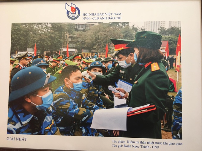 Tôn vinh các ấn phẩm và tác phẩm ảnh báo chí tiêu biểu - Ảnh 4. Tôn vinh các ấn phẩm và tác phẩm ảnh báo chí tiêu biểu - Ảnh 4.