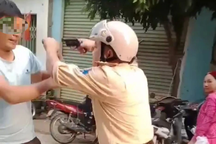Bị người vi phạm đuổi đánh, cán bộ CSGT dùng súng bắn chỉ thiên