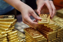 Giá vàng giảm mạnh, văng khỏi mốc 1.800 USD/ounce