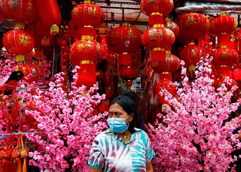 Người dân châu Á tất bật chuẩn bị đón năm mới - 15