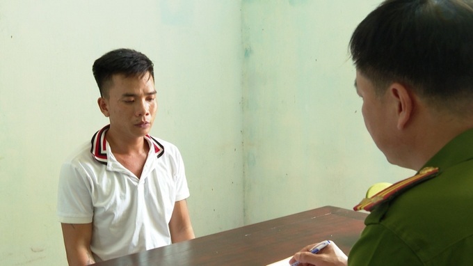 Phạm Văn Quang tại cơ quan Công an. Ảnh: CA cung cấp