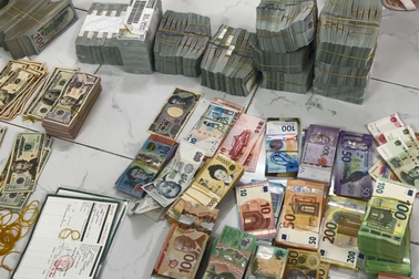 Thu giữ 9 tỷ đồng, 1,5 triệu USD trong đường dây "rửa tiền" ở TPHCM
