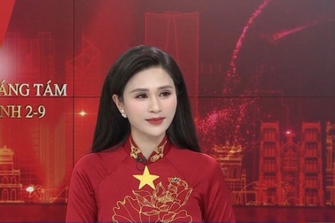 Nhan sắc nữ BTV diện áo dài đỏ gây chú ý ở bản tin Thời sự VTV ngày đại lễ