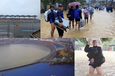 Hình ảnh bóng đá Việt Nam bị ảnh hưởng mưa bão gây xúc động trên báo Thái