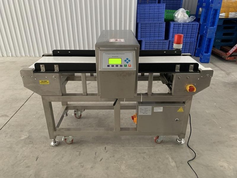 Chọn máy dò kim loại băng tải chất lượng cho công ty thực phẩm, may mặc - 2 Chọn máy dò kim loại băng tải chất lượng cho công ty thực phẩm, may mặc - 2