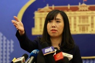 Bộ Ngoại giao lên tiếng vụ du khách Trung Quốc mặc đồng phục “đường lưỡi bò” phi pháp