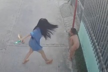 Bé trai 8 tuổi bị người phụ nữ trói cột điện đánh đập dã man