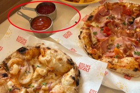 Hà Nội: Khách ăn pizza bức xúc vì bị tính thêm tiền tương ớt, tương cà