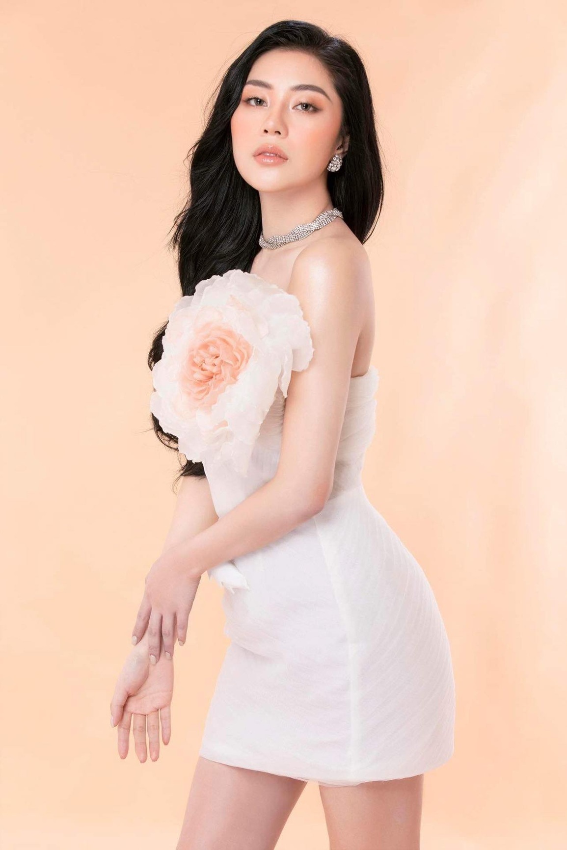 Hoa hậu Tô Diệp Hà quyến rũ trong bộ ảnh đón Tết - 7