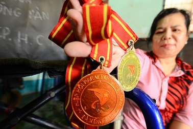 ​Tấm lòng vàng của nữ vận động viên khuyết tật