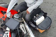 Dùng xe máy chở trạm BTS giả để phát tán tin nhắn lừa đảo