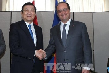 Chủ tịch nước Trương Tấn Sang gặp gỡ Tổng thống Pháp