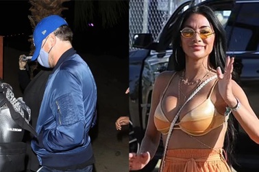 Leonardo DiCaprio đeo khẩu trang đi xem ca nhạc cùng "bồ" kém 23 tuổi