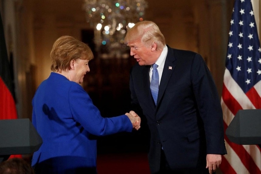 Bà Merkel tiết lộ bí quyết thuyết phục ông Trump - 1