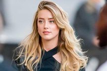 Đang đau khổ vì thua kiện, Amber Heard bất ngờ nhận được lời cầu hôn