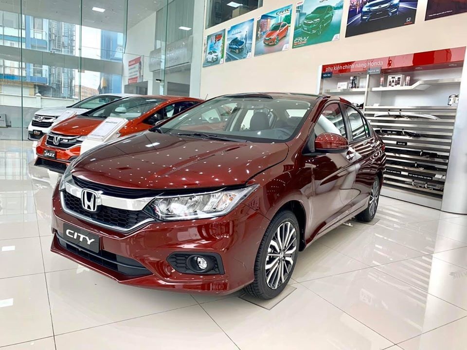 Các hãng vẫn ra sức giảm giá xe xả hàng tồn trước Tết - 3 Các hãng vẫn ra sức giảm giá xe xả hàng tồn trước Tết - 3